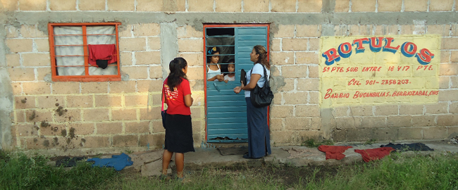 EHC workers visit a family in Mexico.